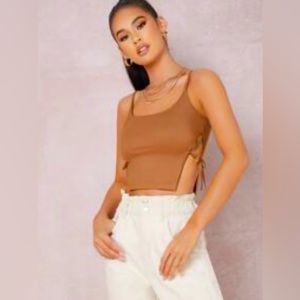 Top with short straps with knots on the sides